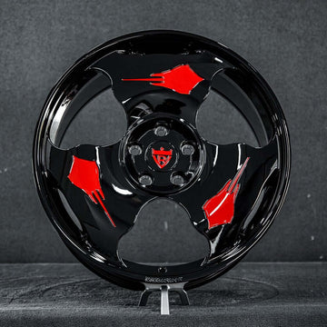 Custom forged monoblock Stingray wheel in black with red accents, perfect for Corvette C7 and unique wheel designs.